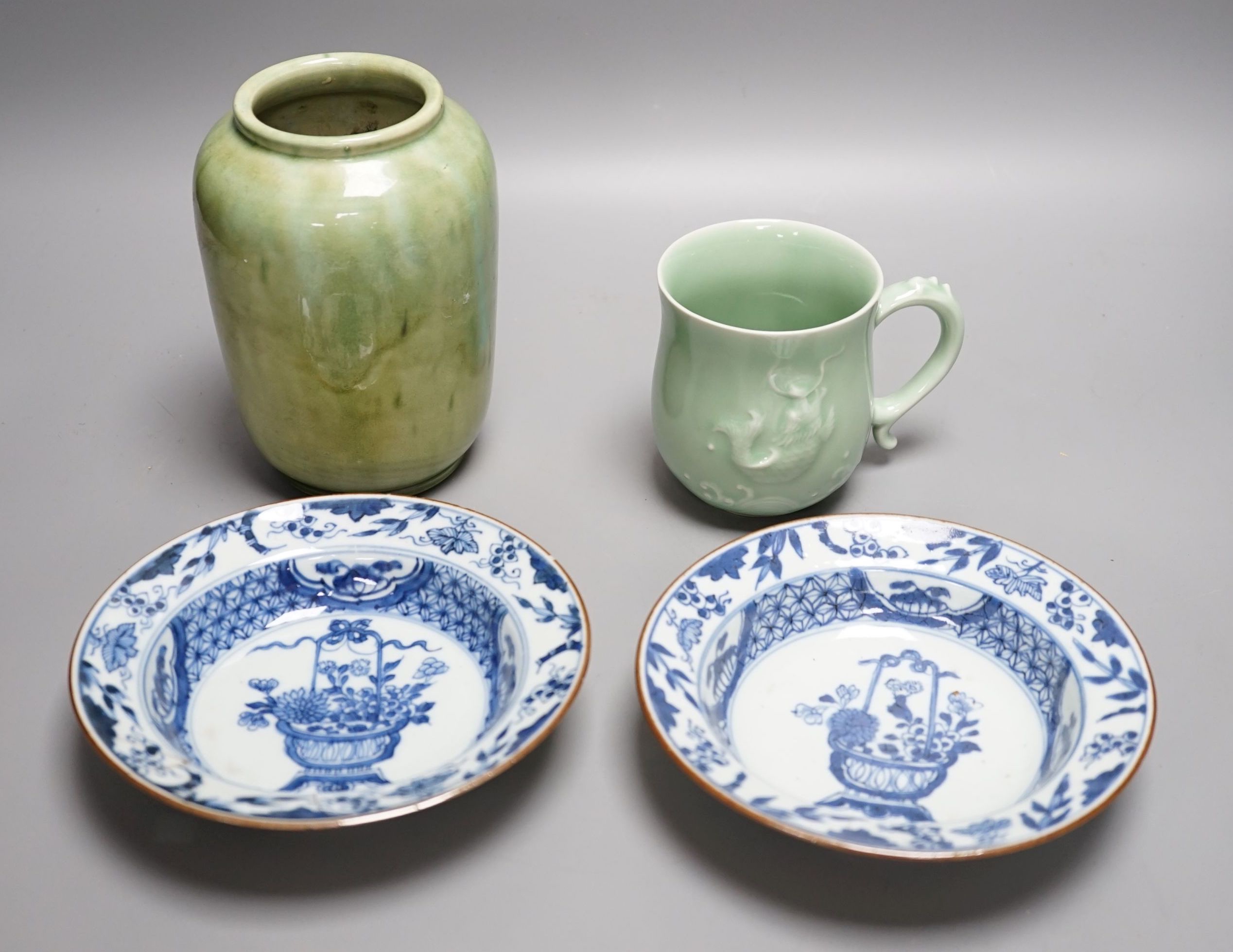 Two Chinese blue and white export dishes, a celadon cup and green glazed pottery vase, Export dishes 16,5 cms diameter.